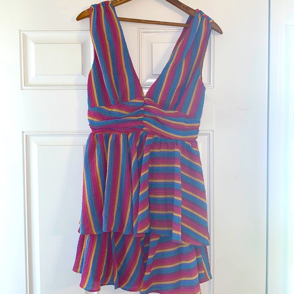 Small “Do Everything With Love Striped Rainbow Dress” from Pink Lily Boutique